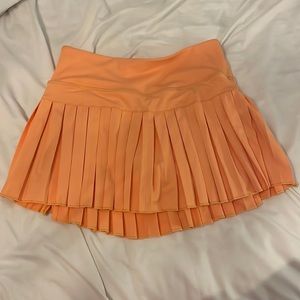 gold hinge pleated skirt